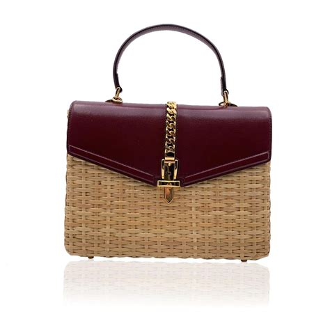red wicker gucci bag